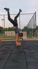 Man performs handstand workout at outdoor fitness park in Burgas