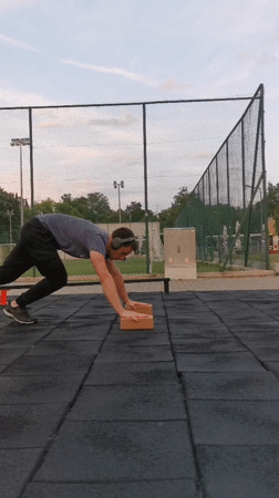 Man performs handstand workout at outdoor fitness park in Burgas