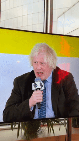 Boris Johnson speaks at official gathering in Kyiv