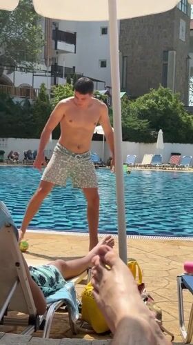 Summer poolside leisure captured at Bulgarian resort