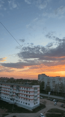 Sunset observed over apartment buildings in Chaikovsky, Russia