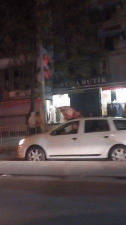 White car blocks sidewalk in Esenyurt, Turkey