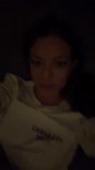 Woman says goodnight in Russian, kisses camera in Thailand