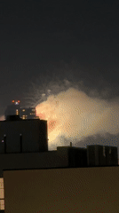 Late-night fireworks display illuminates New York City skyline