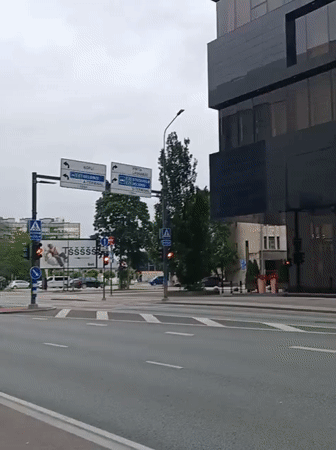 Late-night street-level tour through central Tallinn's mix of old and new