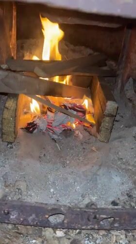 Woman's afternoon activities documented in rural Rusalevka, Russia