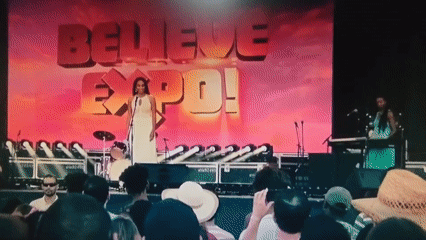 Believe Expo performance and gratitude gesture captured simultaneously