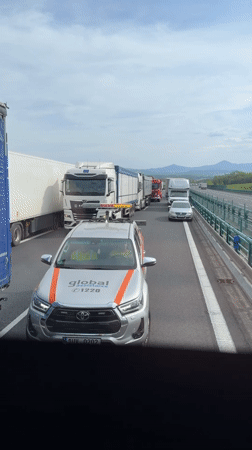 Highway traffic jam with assistance vehicle observed near Telnice