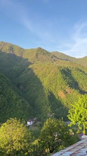 Mountain landscape documented from rooftop in rural Georgia