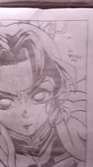 Artist sketches anime character in pencil drawing session