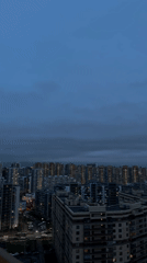 Dusk settles over Kudrovo residential towers