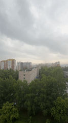Overcast morning views of Izhevsk's tree-lined cityscape