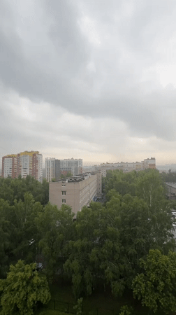 Overcast morning views of Izhevsk's tree-lined cityscape