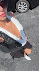 Woman photographed in car in Palm Springs evening