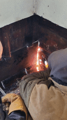 Workers conduct welding operations in Russian industrial facility