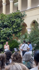 Live chamber music in a Calella courtyard cloister, summer evening
