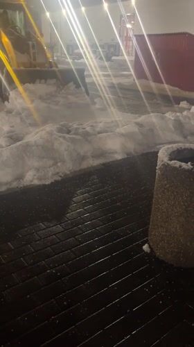 Nighttime snow removal operations continue in Lupanovo, Russia