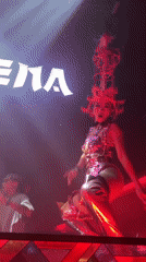 Elaborate costume performance lights up a Bali nightclub.