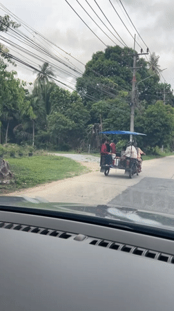 Multi-passenger modified motorcycle spotted in rural Thailand