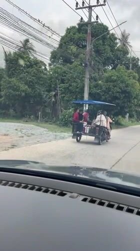 Multi-passenger modified motorcycle spotted in rural Thailand
