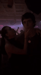 Young people dance at Paris nightclub during late evening