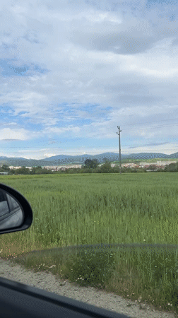 Spring landscape view captured from car near Blagoevgrad, Bulgaria
