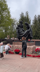 Family visits Soviet war memorial in Klin, Russia