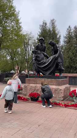 Family visits Soviet war memorial in Klin, Russia