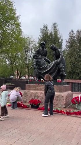Family visits Soviet war memorial in Klin, Russia