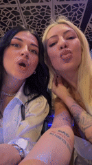 Women celebrate with champagne and selfies at Plovdiv restaurant