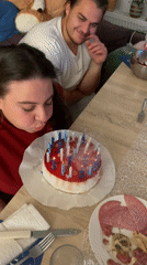 Birthday celebration with decorated cake and appetizers in Saarbrücken