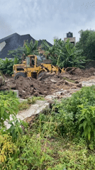 Construction crews operate heavy machinery in Badagry Nigeria