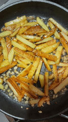 French fries cooked with garlic in Moscow kitchen