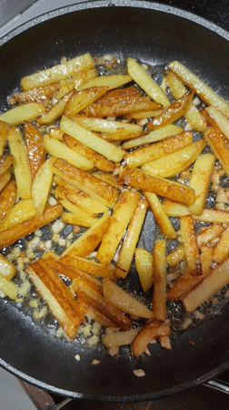 French fries cooked with garlic in Moscow kitchen