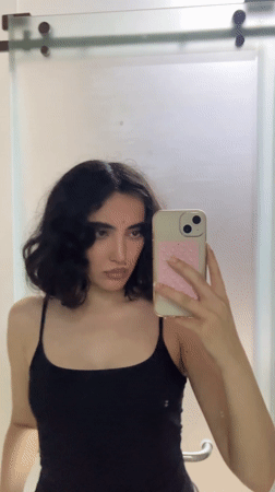 Woman takes mirror selfie in Ho Chi Minh City