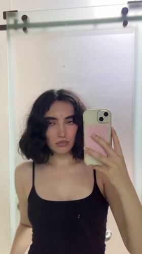 Woman takes mirror selfie in Ho Chi Minh City