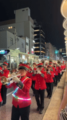 Night parade with marching band, cheerleaders observed in Kyoto