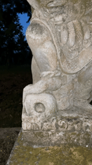 Ancient statue and motorcycle rider documented in Blahbatuh