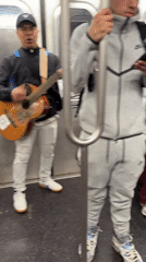 Musician performs acoustic set for NYC subway passengers