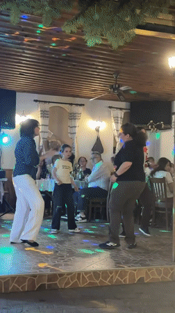 Lively dinner and dancing at a Karlovo restaurant, Bulgaria