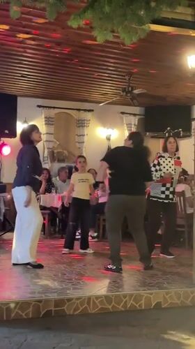 Lively dinner and dancing at a Karlovo restaurant, Bulgaria