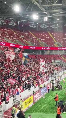Match day in Khimki: stadium full, flags out, train ride included