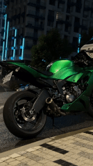 Nighttime street scene documented in Sochi featuring motorcycle, resident