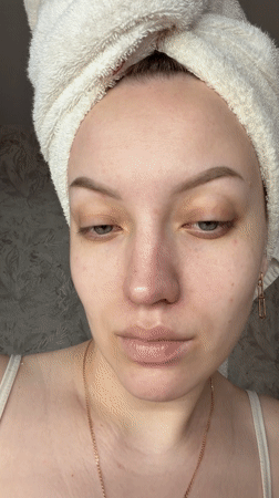 Woman performs morning skincare routine in Reshetnikovo, Russia