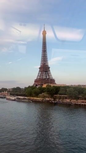 Eiffel Tower and elevated rail lines, Paris evening