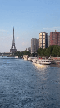 Eiffel Tower and Seine River on a clear Paris afternoon
