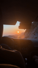 Sunset drive through Montenegro, coffee in hand