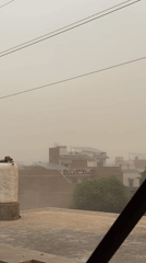 Dust storm reduces visibility in Multan residential areas