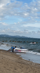 Jet skis, waves, and beach life on a Pattaya morning