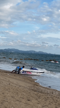 Jet skis, waves, and beach life on a Pattaya morning